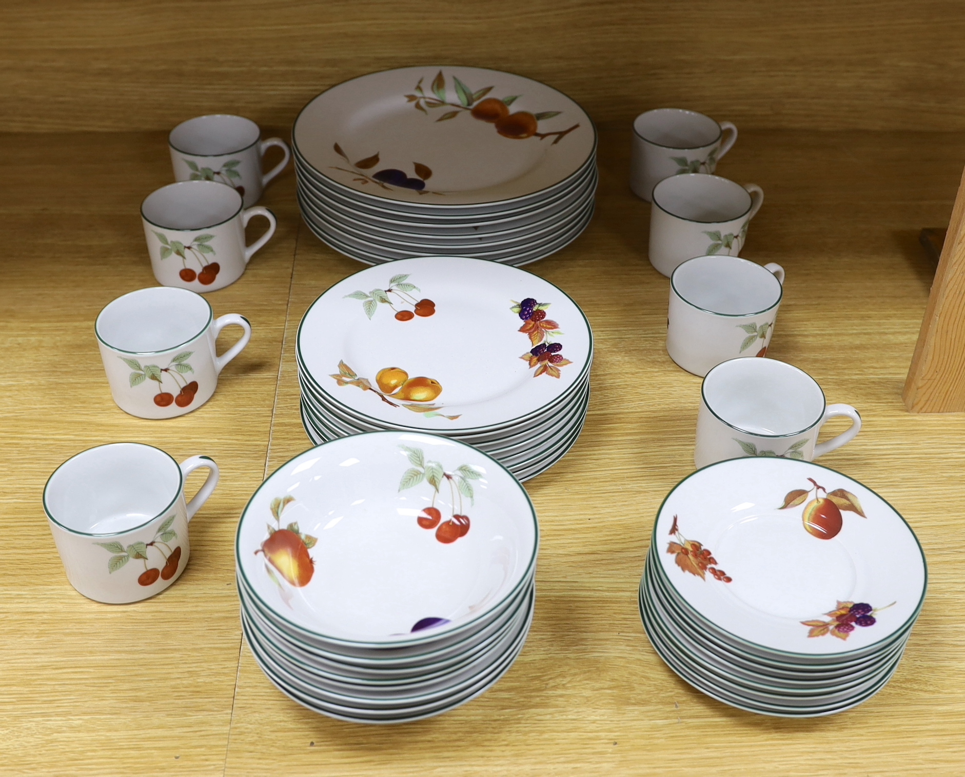 A Royal Worcester “Evesham Vale” eight place setting, dinner and coffee service